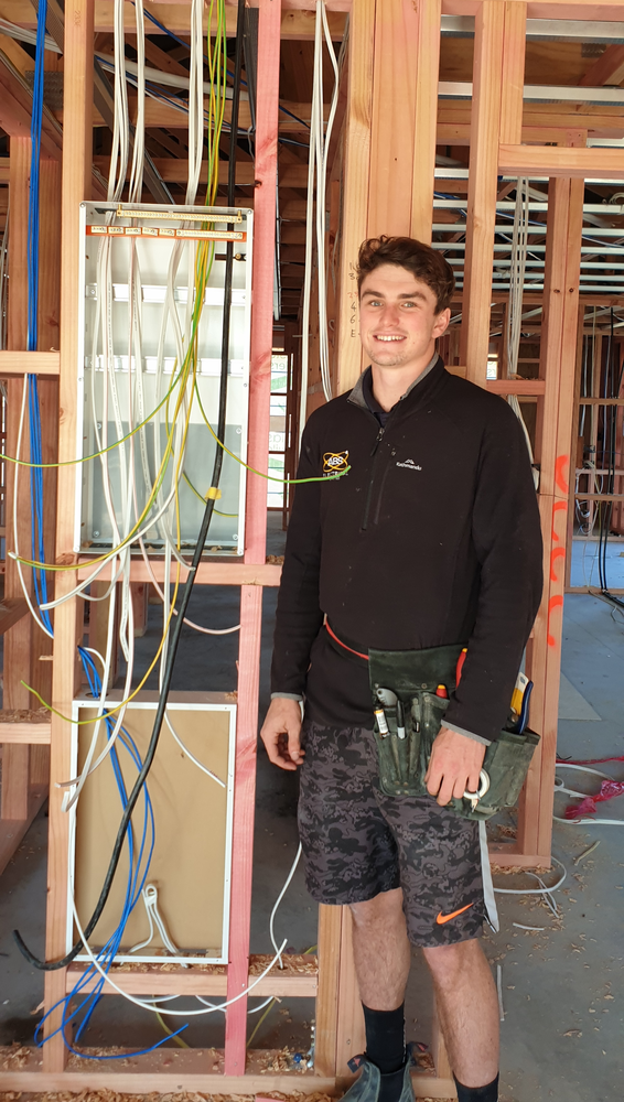 Harry Standing Beside Switchboard at his First ABS Electrical Pre-Wire