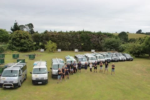 Line up of ABS Electrical Staff and Vehicles